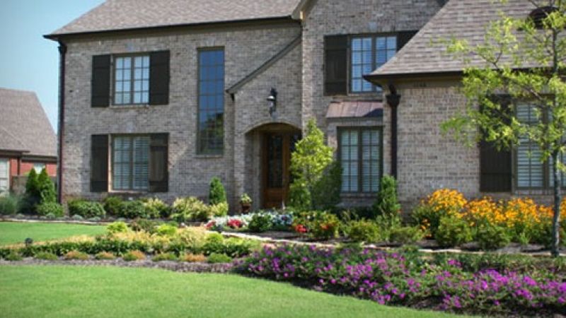 Large office building showing results of a commercial lawn & landscape maintenance program.