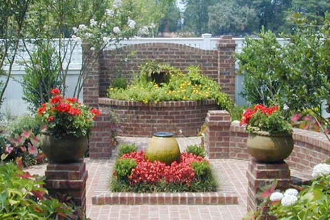 Award winning mason and stone floral bed design.
