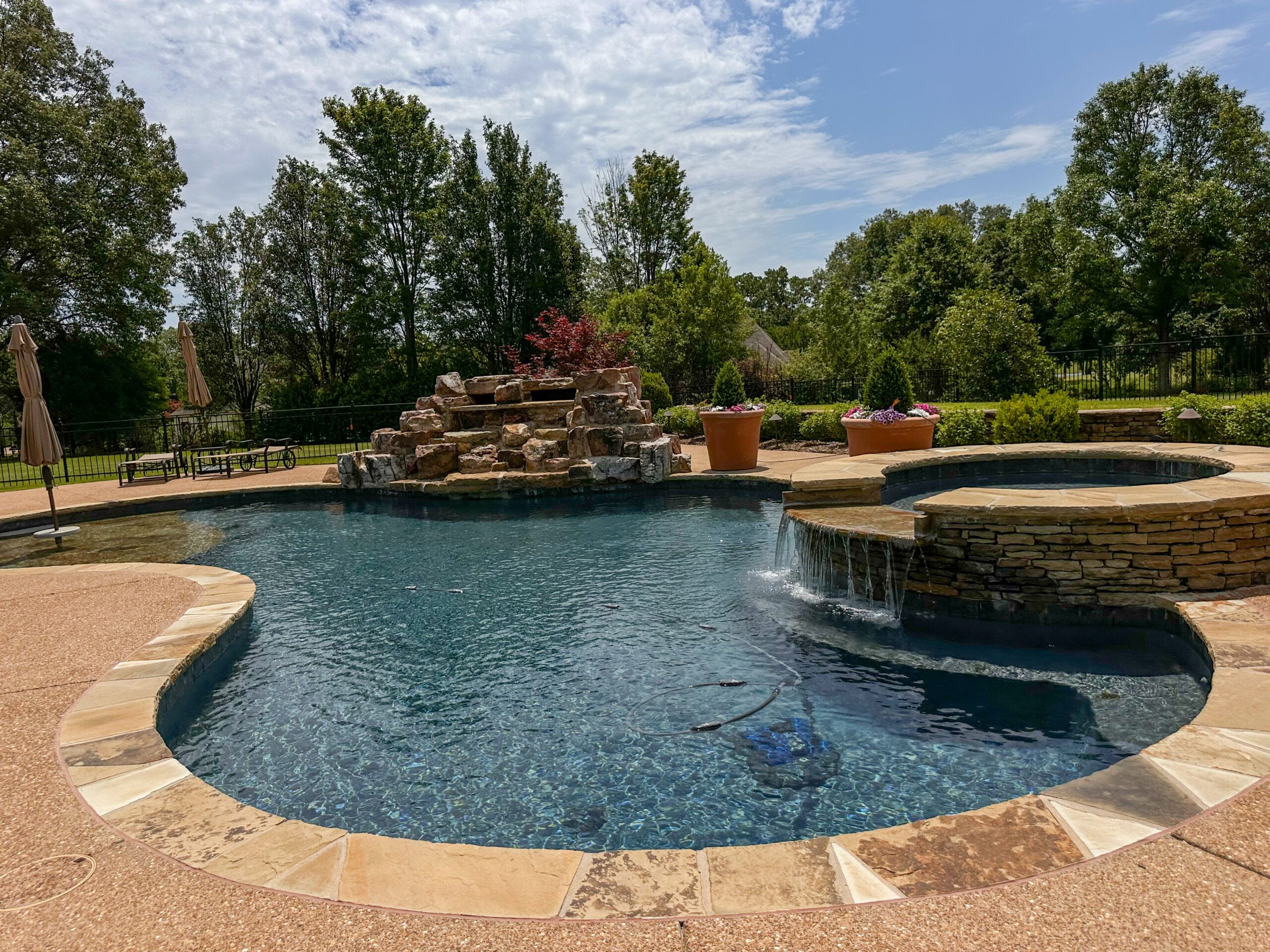 A popular hardscape adored by homeowners is a custom brick wall.